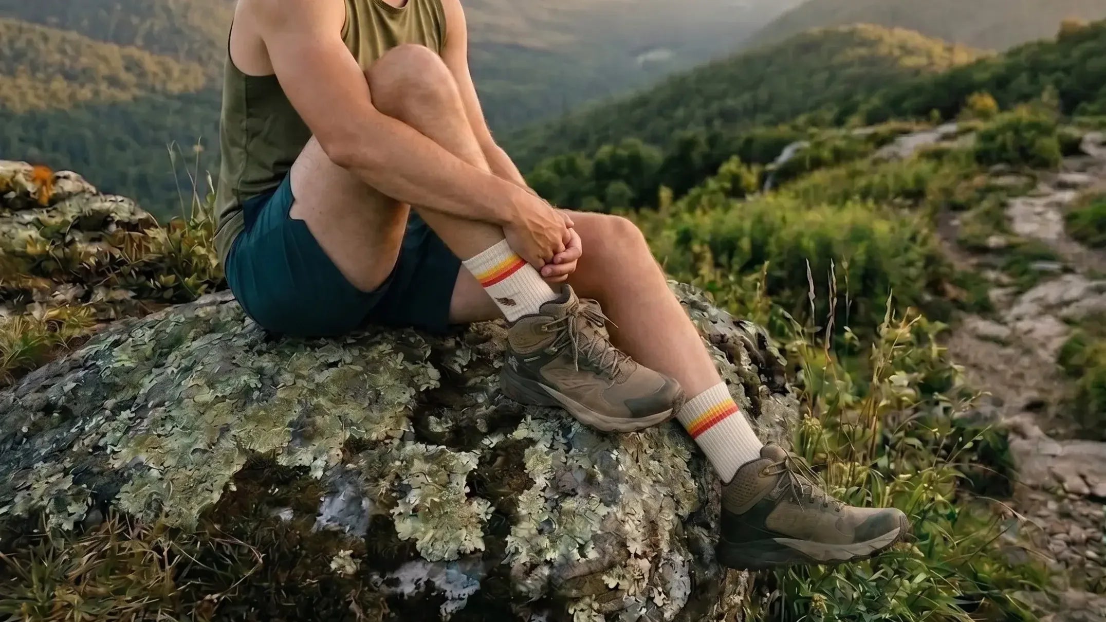 a hiker wears fiber and ore socks